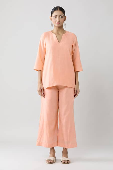 Naintara Bajaj Peach Cotton Split V-neck Pintucked Solid Top And Pant Co-ord Set Online at Aza Fashions Naintara Bajaj_Peach Cotton Split V-neck Pintucked Solid Top And Pant Co-ord Set _Online_at_Aza_Fashions