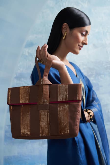 Shop Charkhee Brown Striped Handbag at Aza Fashions Shop_Charkhee_Brown Striped Handbag _at_Aza_Fashions