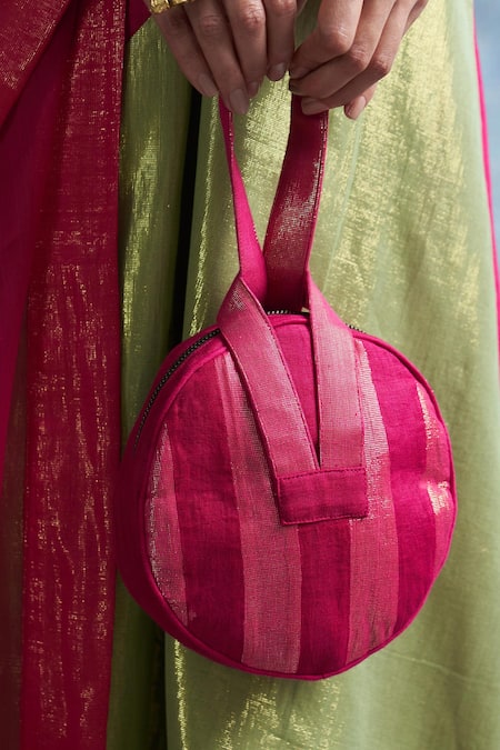 Shop Charkhee Fuchsia Striped Pattern Potli at Aza Fashions Shop_Charkhee_Fuchsia Striped Pattern Potli _at_Aza_Fashions