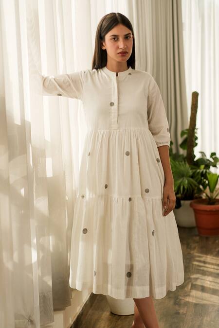 Buy Merakus White Cotton Round Neck Polka Print Tiered Flared Midi Dress Online at Aza Fashions Buy_Merakus_White Cotton Round Neck Polka Print Tiered Flared Midi Dress _Online_at_Aza_Fashions