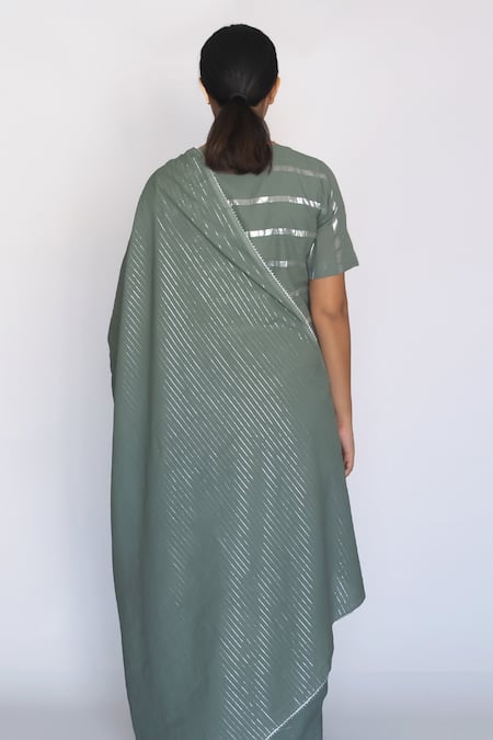 Shop Merakus Green Cotton Zari Round Neck Embroidered Saree With Blouse at Aza Fashions Shop_Merakus_Green Cotton Zari Round Neck Embroidered Saree With Blouse _at_Aza_Fashions