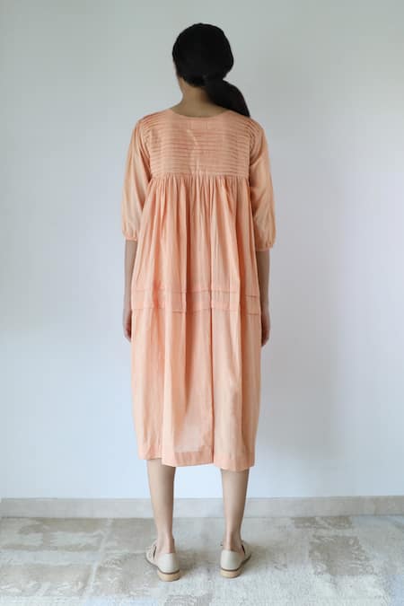 Shop_Merakus_Peach Cotton Round Neck Pleated Yoke Dress _at_Aza_Fashions