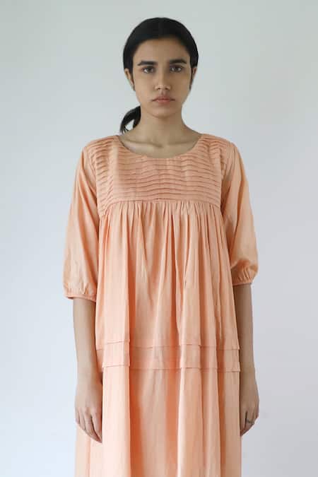 Merakus_Peach Cotton Round Neck Pleated Yoke Dress _Online_at_Aza_Fashions