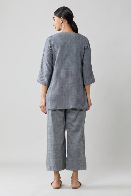 Shop Naintara Bajaj Grey Cotton Split V-neck Pintucked Top And Solid Pant Co-ord Set at Aza Fashions Shop_Naintara Bajaj_Grey Cotton Split V-neck Pintucked Top And Solid Pant Co-ord Set _at_Aza_Fashions