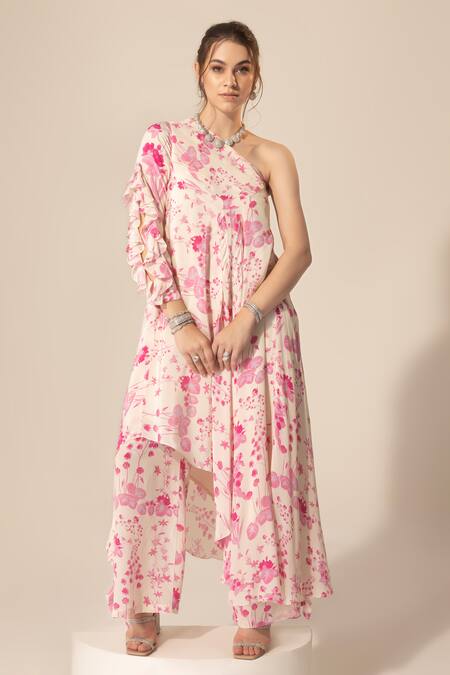 Shop_SAKSHI GIRRI_Ivory Crepe Ruffles One Shoulder Botanical Print Tunic And Pant Set_Online_at_Aza_Fashions