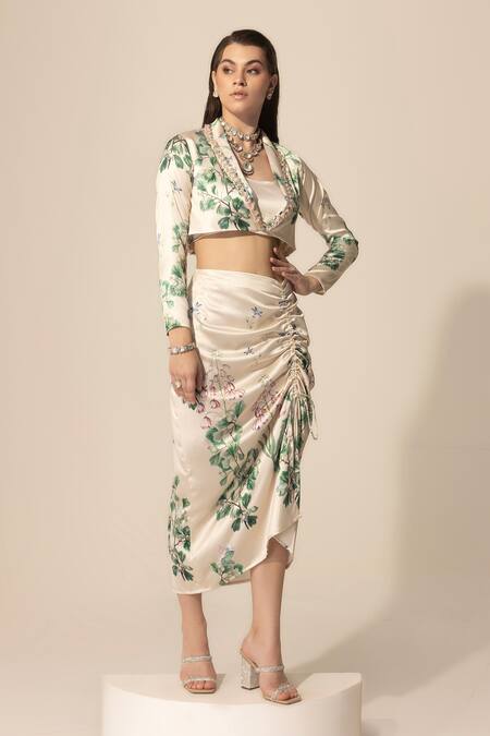 SAKSHI GIRRI Ivory Satin Sequins, Beads, Stones Botanical Print Blazer And Skirt Set at Aza Fashions SAKSHI GIRRI_Ivory Satin Sequins, Beads, Stones Botanical Print Blazer And Skirt Set_at_Aza_Fashions
