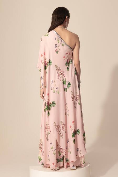 Shop SAKSHI GIRRI Pink Georgette Sequins, Stones One Shoulder Botanical Print Tunic And Sharara Set at Aza Fashions Shop_SAKSHI GIRRI_Pink Georgette Sequins, Stones One Shoulder Botanical Print Tunic And Sharara Set_at_Aza_Fashions