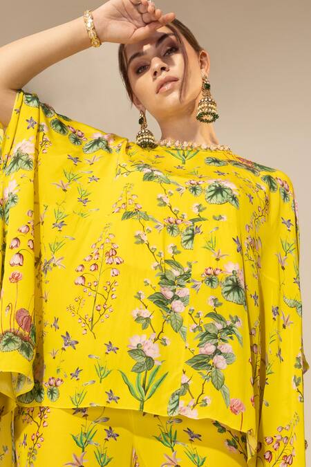 SAKSHI GIRRI Yellow Crepe Sequins Botanical Print Cape And Bell Bottom Pant Set Online at Aza Fashions SAKSHI GIRRI_Yellow Crepe Sequins Botanical Print Cape And Bell Bottom Pant Set_Online_at_Aza_Fashions
