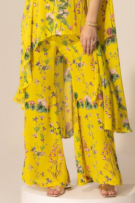 Buy SAKSHI GIRRI Yellow Crepe Sequins Botanical Print Cape And Bell Bottom Pant Set Online at Aza Fashions Buy_SAKSHI GIRRI_Yellow Crepe Sequins Botanical Print Cape And Bell Bottom Pant Set_Online_at_Aza_Fashions