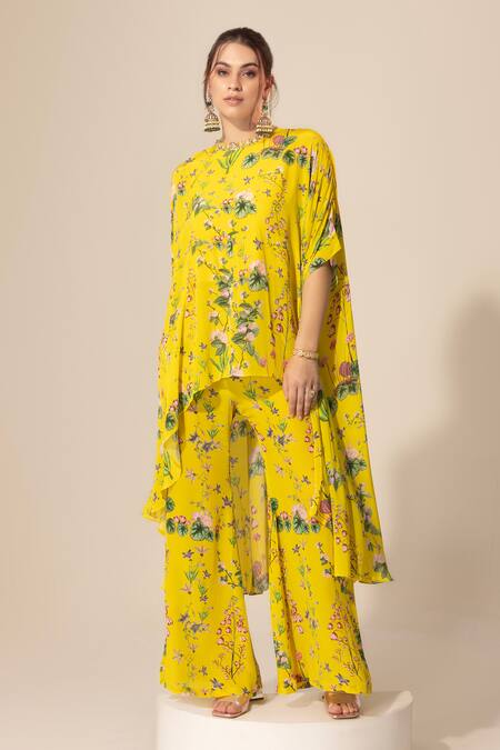 Shop SAKSHI GIRRI Yellow Crepe Sequins Botanical Print Cape And Bell Bottom Pant Set Online at Aza Fashions Shop_SAKSHI GIRRI_Yellow Crepe Sequins Botanical Print Cape And Bell Bottom Pant Set_Online_at_Aza_Fashions