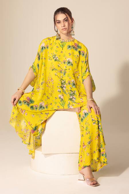 SAKSHI GIRRI Yellow Crepe Sequins Botanical Print Cape And Bell Bottom Pant Set at Aza Fashions SAKSHI GIRRI_Yellow Crepe Sequins Botanical Print Cape And Bell Bottom Pant Set_at_Aza_Fashions