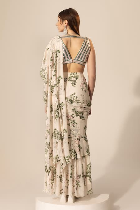 Shop SAKSHI GIRRI Ivory Georgette Sequins, Beads, Stones Botanical Print Ruffle Pre-stitched Saree at Aza Fashions Shop_SAKSHI GIRRI_Ivory Georgette Sequins, Beads, Stones Botanical Print Ruffle Pre-stitched Saree_at_Aza_Fashions