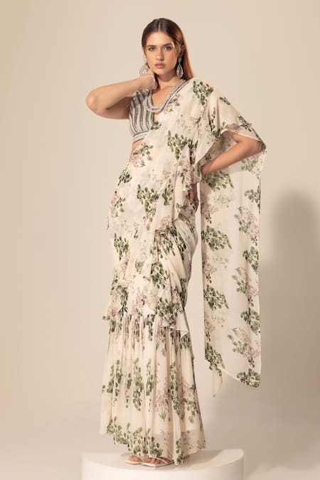 SAKSHI GIRRI Ivory Georgette Sequins, Beads, Stones Botanical Print Ruffle Pre-stitched Saree Online at Aza Fashions SAKSHI GIRRI_Ivory Georgette Sequins, Beads, Stones Botanical Print Ruffle Pre-stitched Saree_Online_at_Aza_Fashions