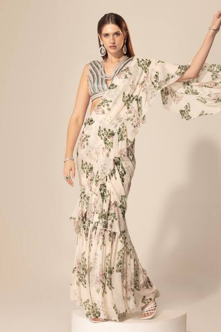 Buy SAKSHI GIRRI Ivory Georgette Sequins, Beads, Stones Botanical Print Ruffle Pre-stitched Saree Online at Aza Fashions Buy_SAKSHI GIRRI_Ivory Georgette Sequins, Beads, Stones Botanical Print Ruffle Pre-stitched Saree_Online_at_Aza_Fashions
