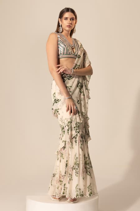 Shop SAKSHI GIRRI Ivory Georgette Sequins, Beads, Stones Botanical Print Ruffle Pre-stitched Saree Online at Aza Fashions Shop_SAKSHI GIRRI_Ivory Georgette Sequins, Beads, Stones Botanical Print Ruffle Pre-stitched Saree_Online_at_Aza_Fashions
