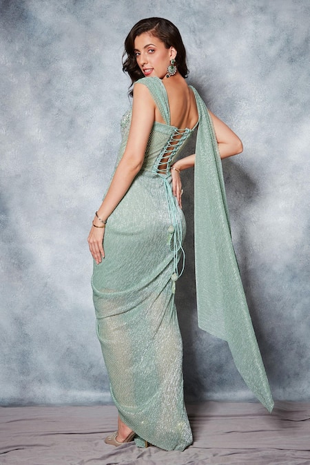 Shop Saaj By Ankita Green Georgette Sequins, Textured Pre-draped Saree With Mesh Corset Blouse at Aza Fashions Shop_Saaj By Ankita_Green Georgette Sequins, Textured Pre-draped Saree With Mesh Corset Blouse _at_Aza_Fashions