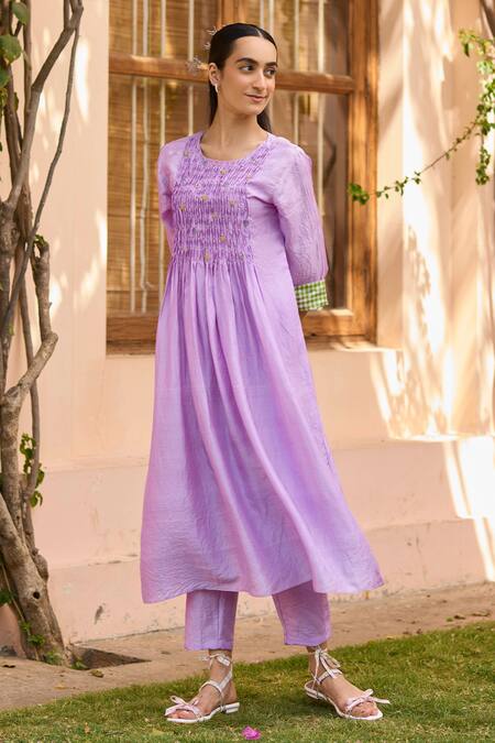 Shop Surmaye Purple Silk Beads Round Neck Bloom Embellished Smocked Yoke Kurta With Pant Online at Aza Fashions Shop_Surmaye_Purple Silk Beads Round Neck Bloom Embellished Smocked Yoke Kurta With Pant _Online_at_Aza_Fashions