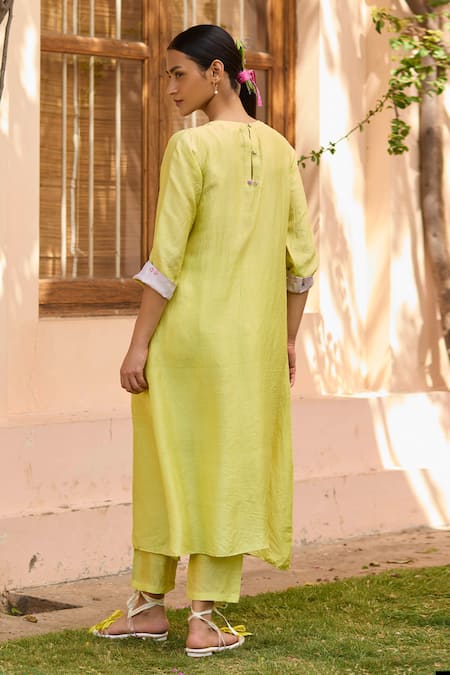 Shop Surmaye Green Handloom Cotton, Silk Blossom Embellished Smocked Yoke Kurta With Pant at Aza Fashions Shop_Surmaye_Green Handloom Cotton, Silk Blossom Embellished Smocked Yoke Kurta With Pant _at_Aza_Fashions