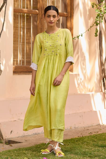 Surmaye Green Handloom Cotton, Silk Blossom Embellished Smocked Yoke Kurta With Pant Online at Aza Fashions Surmaye_Green Handloom Cotton, Silk Blossom Embellished Smocked Yoke Kurta With Pant _Online_at_Aza_Fashions