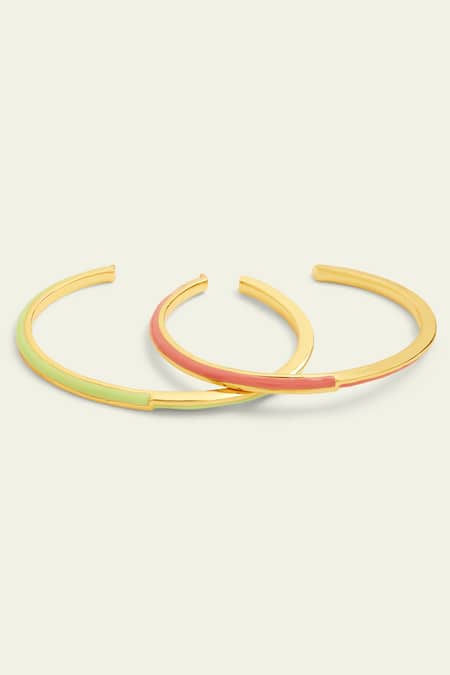 Shop Isharya Gold Plated Double Enamelled Bangle Bracelets Set Of 2 at Aza Fashions Shop_Isharya_Gold Plated Double Enamelled Bangle Bracelets Set Of 2 _at_Aza_Fashions