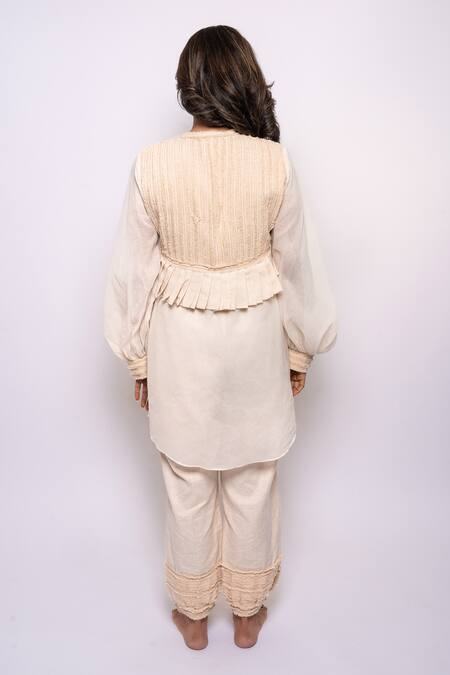 Shop Anmol Kakad Cream Cotton Fringe, Applique V-neck Embroidered Jacket Pant Set at Aza Fashions Shop_Anmol Kakad_Cream Cotton Fringe, Applique V-neck Embroidered Jacket Pant Set_at_Aza_Fashions