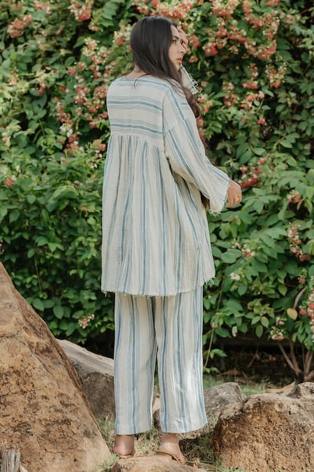 Shop Akashi Clothing Cream Cotton Round Neck Frayed Hem Stripe Pattern Short Tunic at Aza Fashions Shop_Akashi Clothing_Cream Cotton Round Neck Frayed Hem Stripe Pattern Short Tunic _at_Aza_Fashions