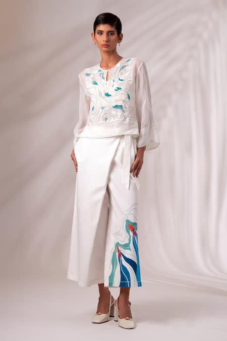 Shop Madder Much White Cotton Sequins, Embroidery Round Neck Ruben Wave Top Pant Set at Aza Fashions Shop_Madder Much_White Cotton Sequins, Embroidery Round Neck Ruben Wave Top Pant Set _at_Aza_Fashions