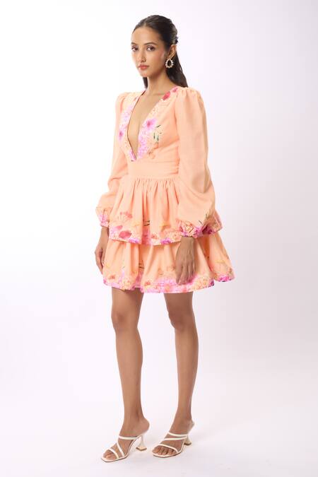 Shop Verano By Tanya Peach Linen Embroidery Plunge Neck Amelia Gardenia Print Tiered Short Dress Online at Aza Fashions Shop_Verano By Tanya_Peach Linen Embroidery Plunge Neck Amelia Gardenia Print Tiered Short Dress _Online_at_Aza_Fashions