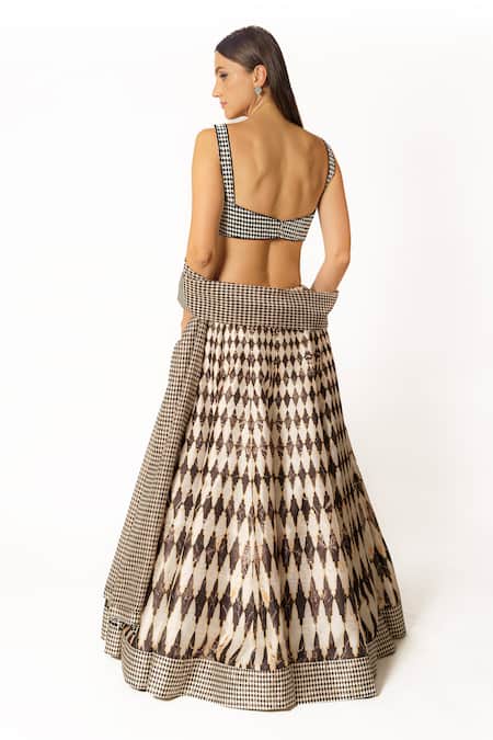 Shop Rabani & Rakha Black Silk Beads, Cut Work Square Neck Geometric Pattern Embroidered Lehenga Set at Aza Fashions Shop_Rabani & Rakha_Black Silk Beads, Cut Work Square Neck Geometric Pattern Embroidered Lehenga Set _at_Aza_Fashions