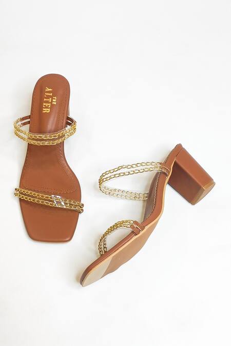 The Alter Brown Metallic Chain Gianna Embellished Slip-on Block Heels at Aza Fashions The Alter_Brown Metallic Chain Gianna Embellished Slip-on Block Heels _at_Aza_Fashions