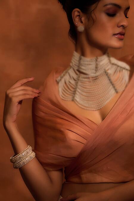 Tarun Tahiliani Ivory Pearls, Zari Embellished Pair Of Bangles Online at Aza Fashions Tarun Tahiliani_Ivory Pearls, Zari Embellished Pair Of Bangles _Online_at_Aza_Fashions