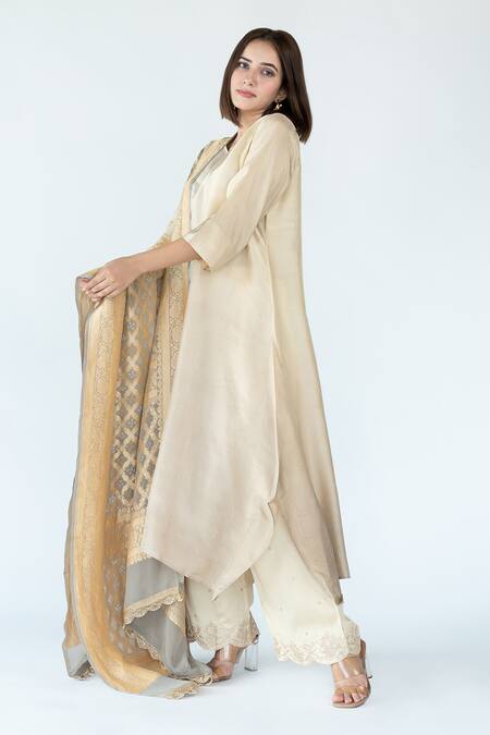 Buy_Meghna Panchmatia_Ivory Silk Embroidery, Zari Round Neck Asymmetric Kurta With Woven Dupatta _Online_at_Aza_Fashions