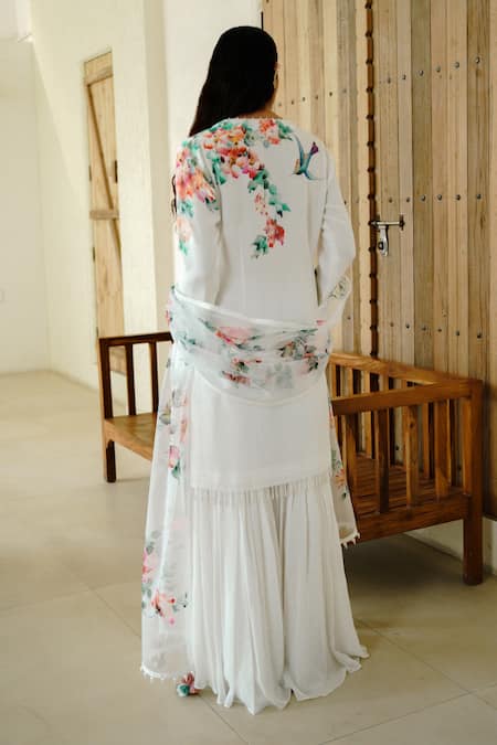 Shop Wabi Sabi By Anshum-Ritesh Ivory Georgette Beads, Tassels Spring Blossom Handpainted Kurta Sharara Set at Aza Fashions Shop_Wabi Sabi By Anshum-Ritesh_Ivory Georgette Beads, Tassels Spring Blossom Handpainted Kurta Sharara Set _at_Aza_Fashions