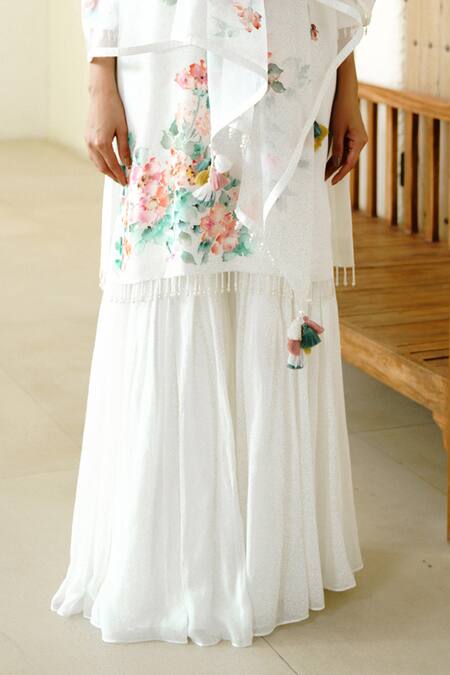 Buy Wabi Sabi By Anshum-Ritesh Ivory Georgette Beads, Tassels Spring Blossom Handpainted Kurta Sharara Set Online at Aza Fashions Buy_Wabi Sabi By Anshum-Ritesh_Ivory Georgette Beads, Tassels Spring Blossom Handpainted Kurta Sharara Set _Online_at_Aza_Fashions