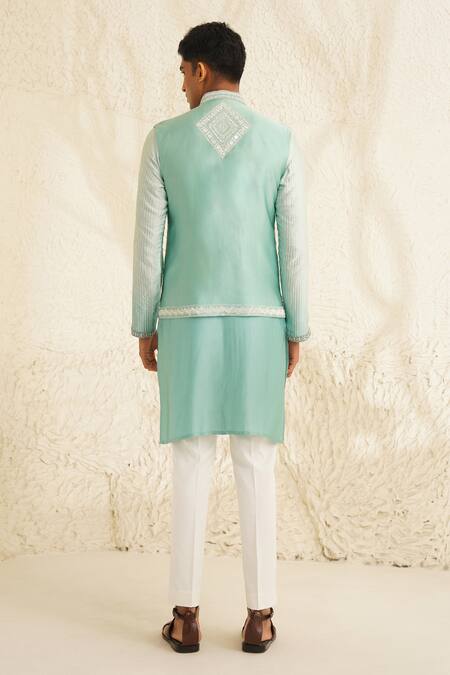 Shop Shreyansh Designs Blue Dupion Silk Embroidery Mirror Cyan Bundi And Kurta Set at Aza Fashions Shop_Shreyansh Designs_Blue Dupion Silk Embroidery Mirror Cyan Bundi And Kurta Set _at_Aza_Fashions