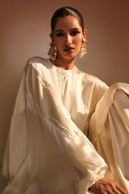 Shop_AK-OK_Cream Silk Placement Embellished Cape And Lungi Skirt Set _Online_at_Aza_Fashions
