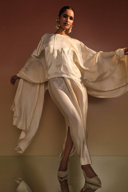 AK-OK_Cream Silk Placement Embellished Cape And Lungi Skirt Set _at_Aza_Fashions