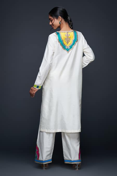 Shop Gulabo By Abu Sandeep Off White Cotton Silk Placement Embroidery Architecture Motif Pant at Aza Fashions Shop_Gulabo By Abu Sandeep_Off White Cotton Silk Placement Embroidery Architecture Motif Pant _at_Aza_Fashions