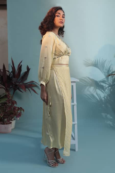 Shop Prahnaaya Yellow Satin Sequins V-neck Masbah Top With Printed Flap Skirt at Aza Fashions Shop_Prahnaaya_Yellow Satin Sequins V-neck Masbah Top With Printed Flap Skirt _at_Aza_Fashions
