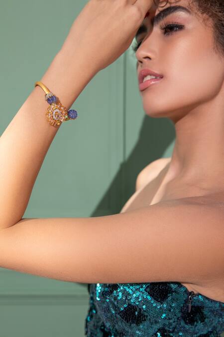 Modarta Gold Plated Stones, Smocking Swarovski And Embellished Bracelet Online at Aza Fashions Modarta_Gold Plated Stones, Smocking Swarovski And Embellished Bracelet_Online_at_Aza_Fashions