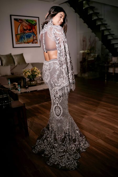Shop Mehul Gupta Silver Net Sequins, Beads Scoop Hand Embroidered Fish Cut Lehenga With Blouse at Aza Fashions Shop_Mehul Gupta_Silver Net Sequins, Beads Scoop Hand Embroidered Fish Cut Lehenga With Blouse _at_Aza_Fashions