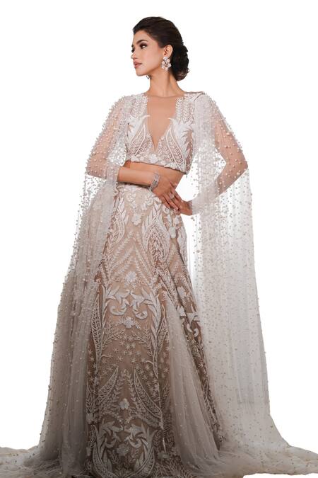 Mehul Gupta Ivory Net Pearls, Cut Work Persian Garden Embroidered Bridal Cape Lehenga Set Online at Aza Fashions Mehul Gupta_Ivory Net Pearls, Cut Work Persian Garden Embroidered Bridal Cape Lehenga Set _Online_at_Aza_Fashions
