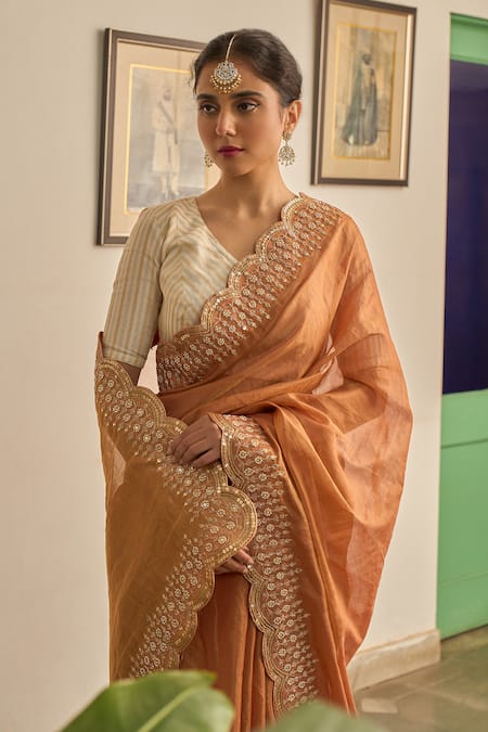 Apeksha Jain Label_Orange Tissue Cut Work, Embroidery V-neck Sunehra Border Saree With Blouse _at_Aza_Fashions