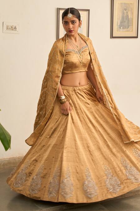 Shop_Apeksha Jain Label_Gold Tissue Embroidery, Zari Sweetheart Neck Hand Lehenga Set _Online_at_Aza_Fashions