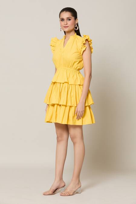 Naintara Bajaj Yellow Cotton V-neck Amalfi Solid Layered Short Dress Online at Aza Fashions Naintara Bajaj_Yellow Cotton V-neck Amalfi Solid Layered Short Dress _Online_at_Aza_Fashions