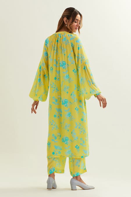 Shop Label Earthen Yellow Viscose, Silk Round Neck Diwo Iris Bloom Print Kurta With Flared Pant at Aza Fashions Shop_Label Earthen_Yellow Viscose, Silk Round Neck Diwo Iris Bloom Print Kurta With Flared Pant _at_Aza_Fashions