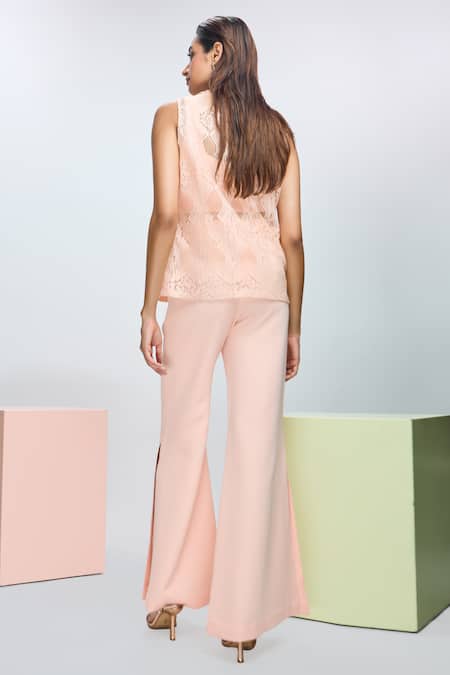 Shop Nirmooha Peach Chiffon, Microfiber Collared Solid Sleeveless Top And Pant Set at Aza Fashions Shop_Nirmooha_Peach Chiffon, Microfiber Collared Solid Sleeveless Top And Pant Set _at_Aza_Fashions