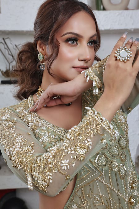 Lasha_Green Tulle, Organza Sequins, Cut Work Layered Pre-draped Saree With Blouse _at_Aza_Fashions