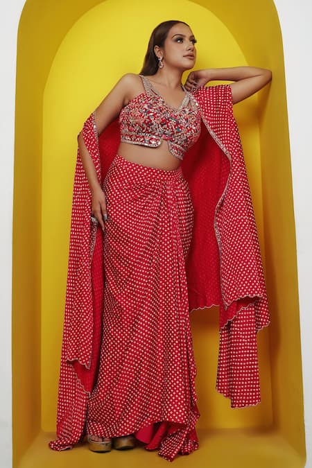 Buy Lasha Pink Satin, Georgette Mirrors, Beads V-neck Bandhani Print Cape Draped Skirt Set Online at Aza Fashions Buy_Lasha_Pink Satin, Georgette Mirrors, Beads V-neck Bandhani Print Cape Draped Skirt Set _Online_at_Aza_Fashions