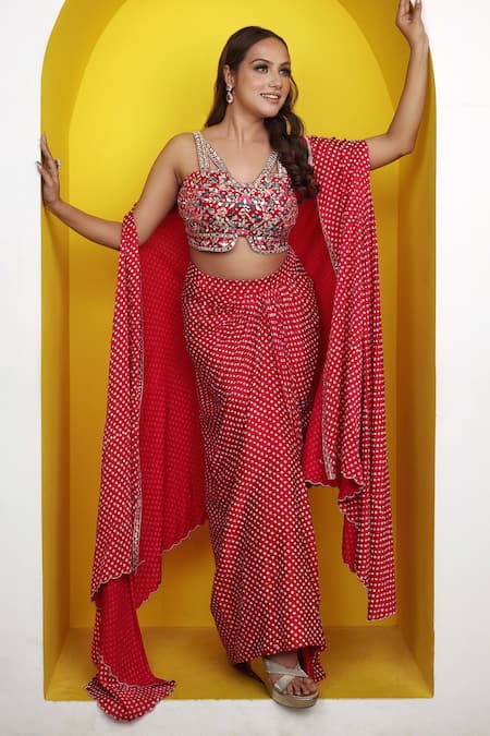 Lasha Pink Satin, Georgette Mirrors, Beads V-neck Bandhani Print Cape Draped Skirt Set at Aza Fashions Lasha_Pink Satin, Georgette Mirrors, Beads V-neck Bandhani Print Cape Draped Skirt Set _at_Aza_Fashions
